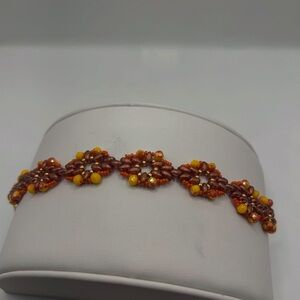 Elegant Beaded Bracelet in Brown and Yellow